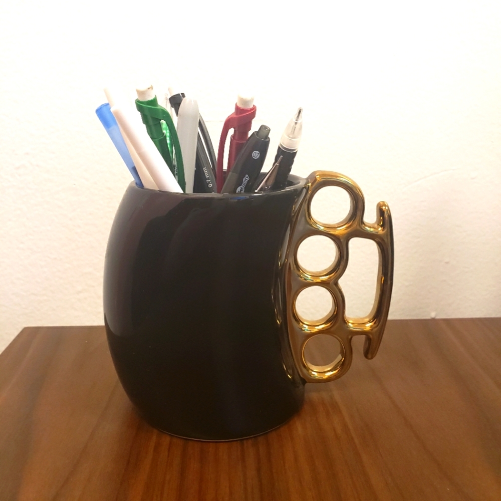 Black and Gold Brass Knuckles handle cup